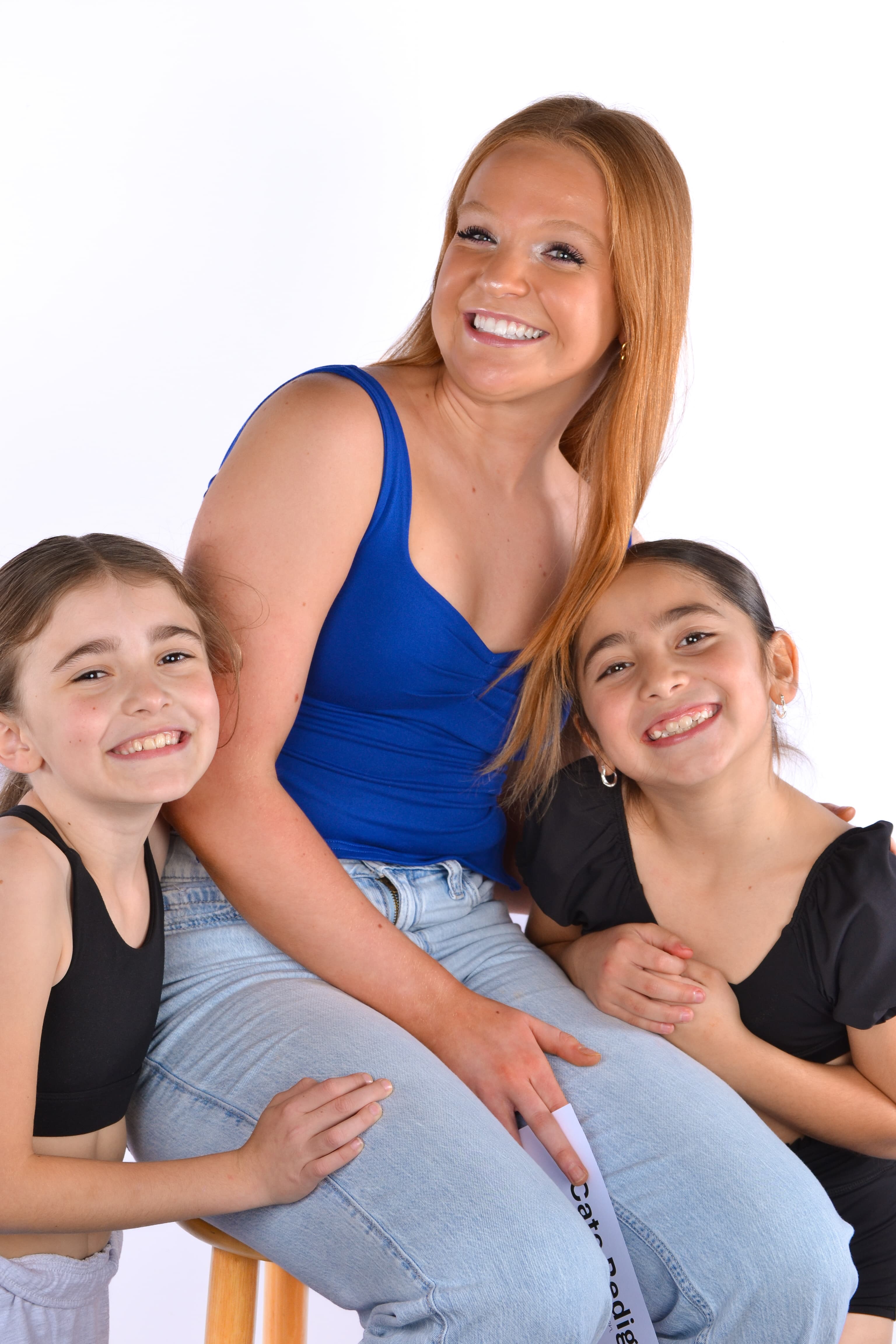 A DanceSpace instructor with two young dancers